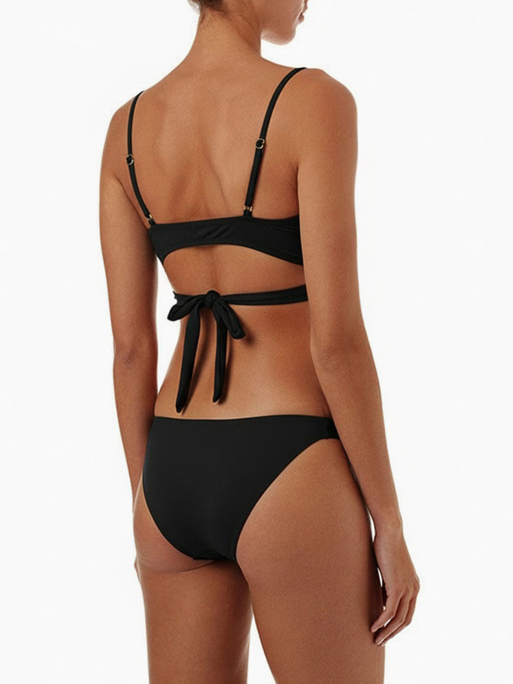 Back view of a woman wearing a black wrap bikini set