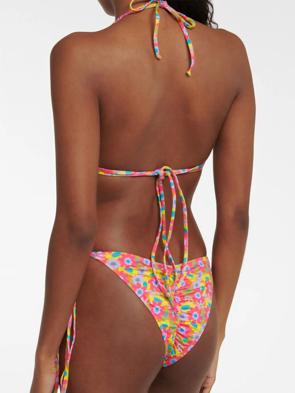 Back view of a floral print bikini set showing the halterneck tie closure and ruched bikini bottoms