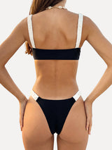 back view of a black and white bikini set with ruched detailing