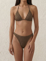 Woman wearing a textured brown bikini set.