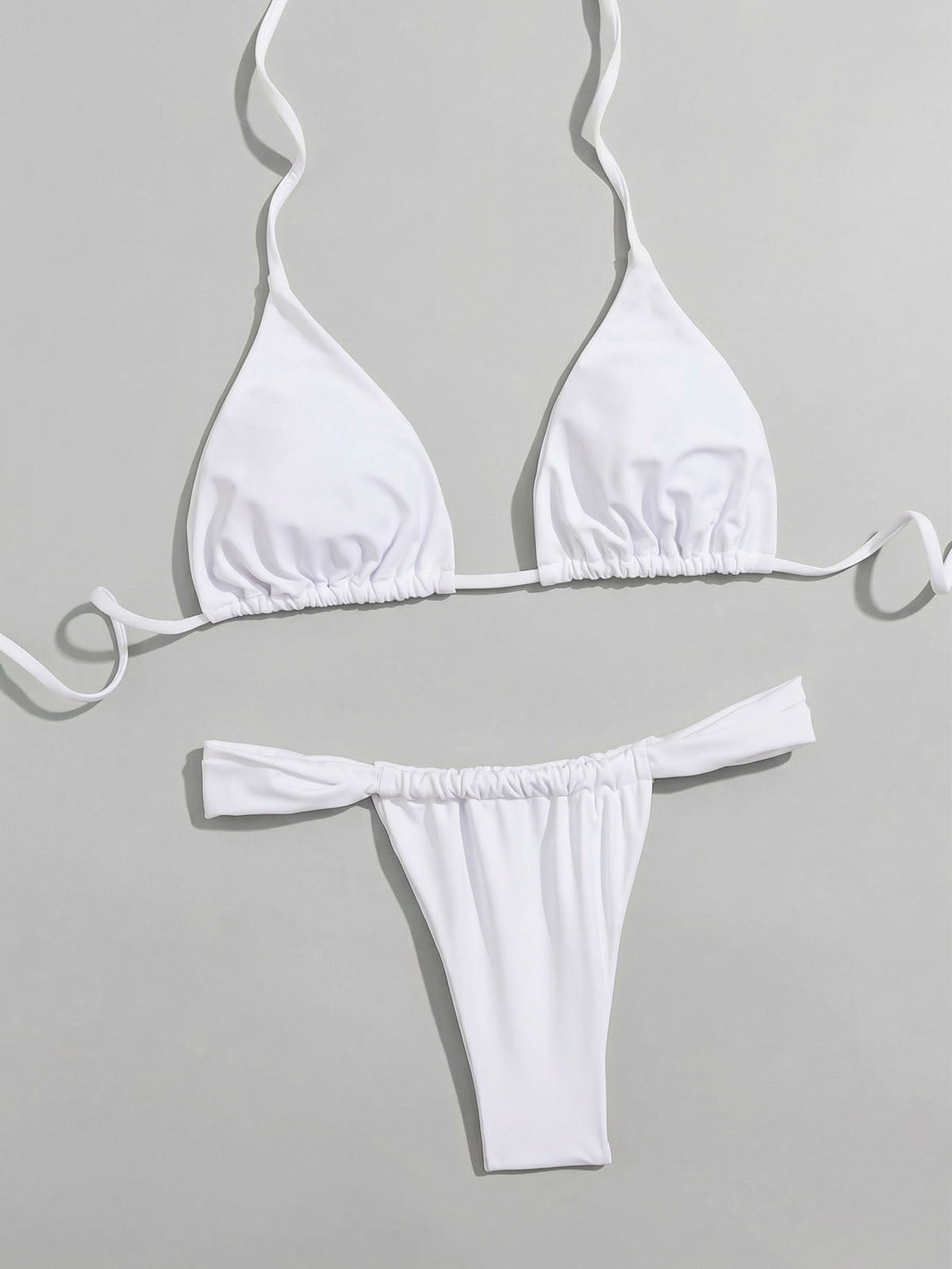 White ribbed bikini set laid flat, showing top and bottom