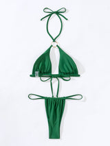 flat lay of a green bikini bottom