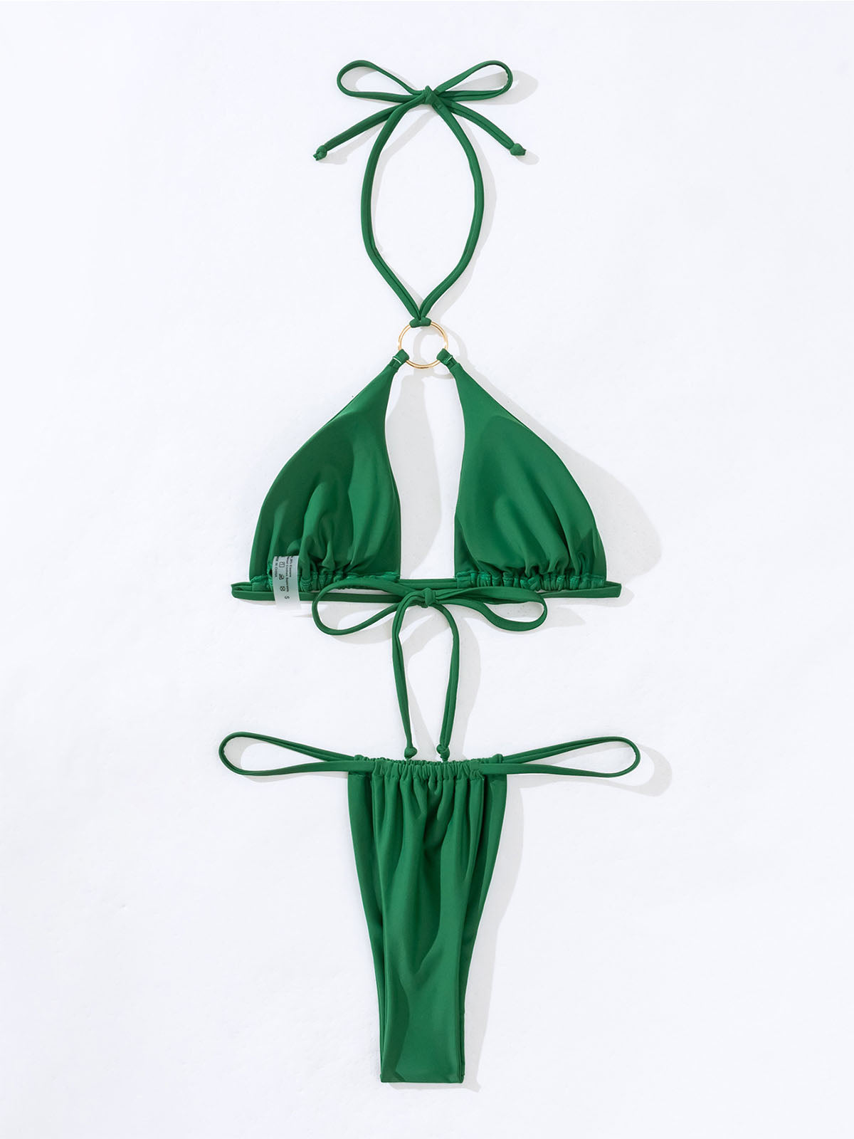 flat lay of a green bikini bottom