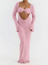 Woman wearing a pink sheer knit maxi dress over a pink bikini